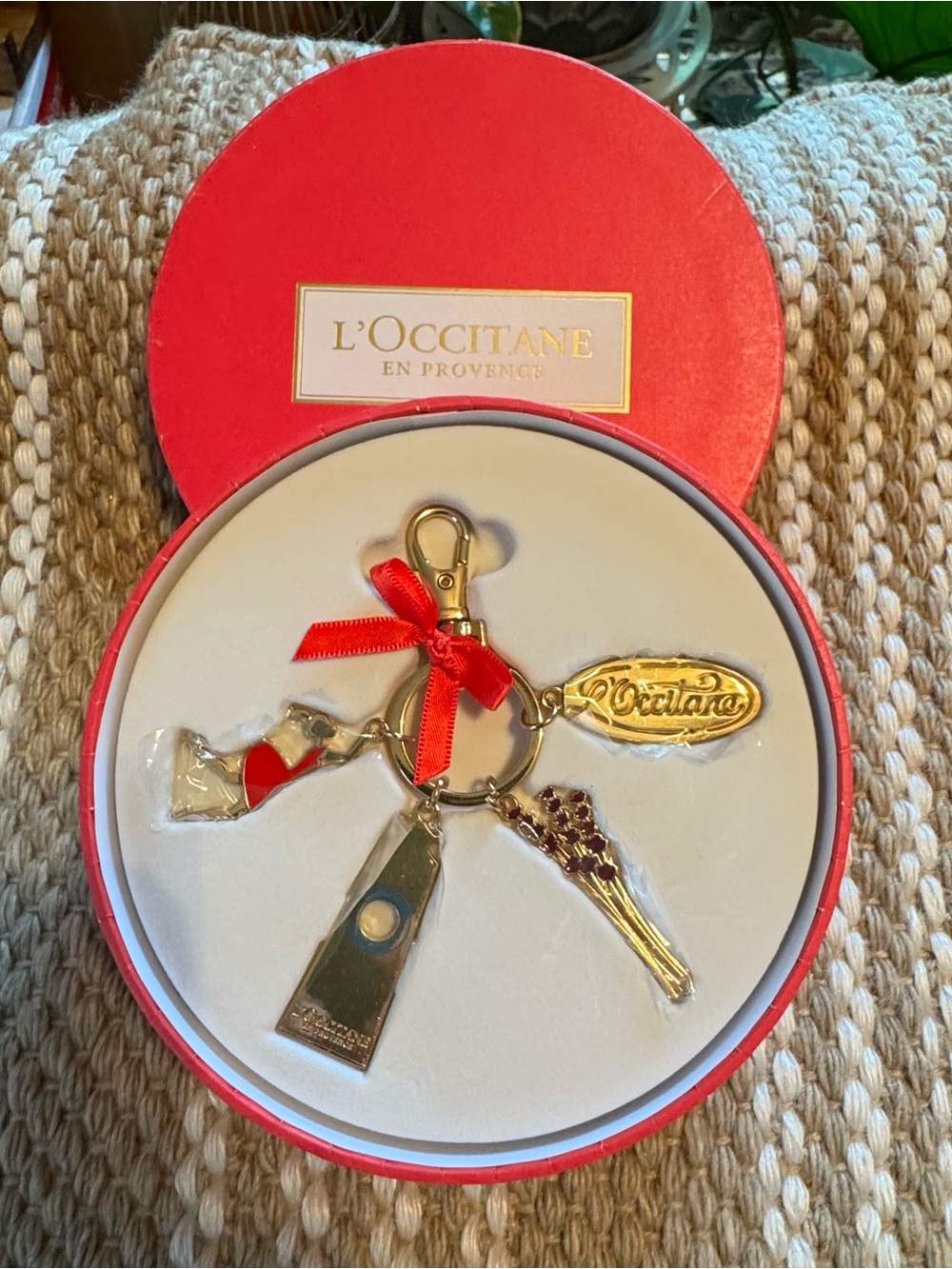 L'OCCITANE Red Ribbon & Gold Charm Keychain